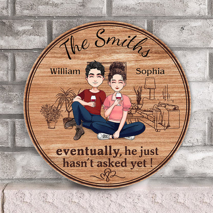 Eventually He Just Hasn't Asked Yet - Personalized Husband And Wife Round Wood Sign