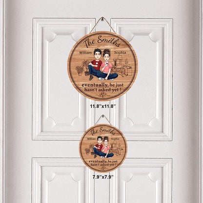 Eventually He Just Hasn't Asked Yet - Personalized Husband And Wife Round Wood Sign